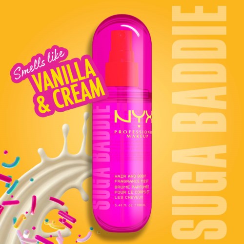 A bright pink spray bottle with yellow text, surrounded by splash and sprinkles, promoting vanilla and cream scent.