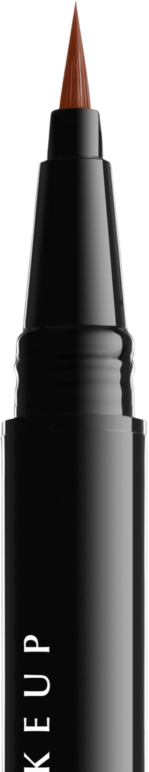 A black eyeliner pen with a pointed tip on a black background.