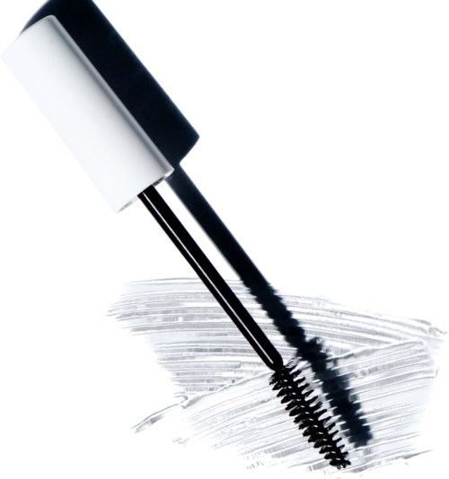 En svart og hvit mascara-børste med hvit mascara på en hvit overflate.