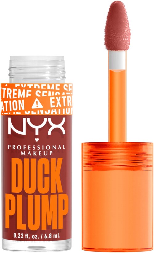 Das Bild zeigt eine Lippenstifthülse mit Pinselapplikator, orange und transparente Verpackung, und Warnhinweise.