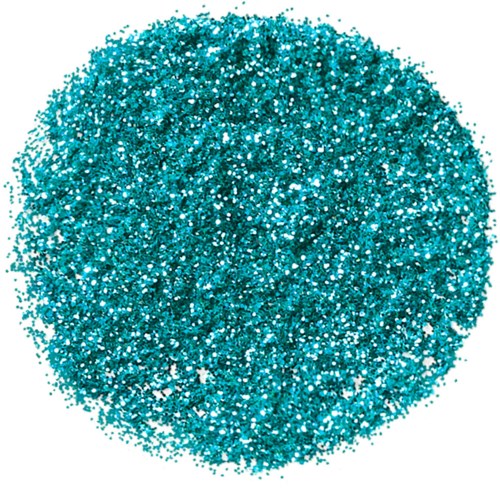 En stor rund hög av glänsande turkos glitterpartiklar. Det är glittrigt och ser ut som att det är spritt på en yta.