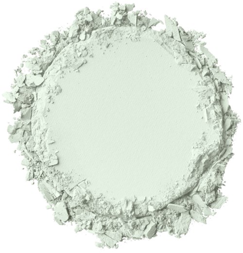 Ett vitt pulverliknande ämne bildar en cirkulär form med brända bitar runt kanterna.