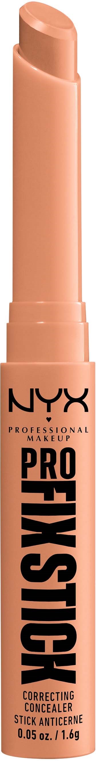 Ein beiger NYX-Concealer-Stick mit schwarzen und orangefarbenen Text, steht aufrecht.