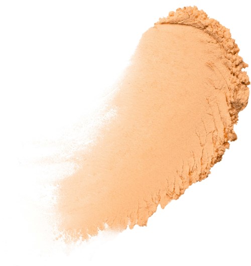 A peach-colored powder is spread out on a white surface, with some powder scattered around its edges.