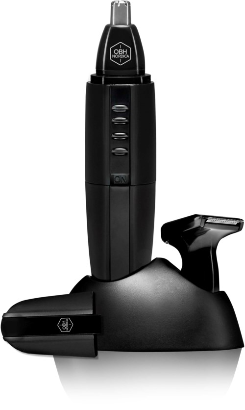 A tattoo machine with a grip and control buttons, placed on a charging dock.