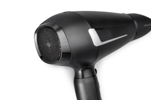 A black hair dryer with a handle, a circular front grill, and a white control switch.