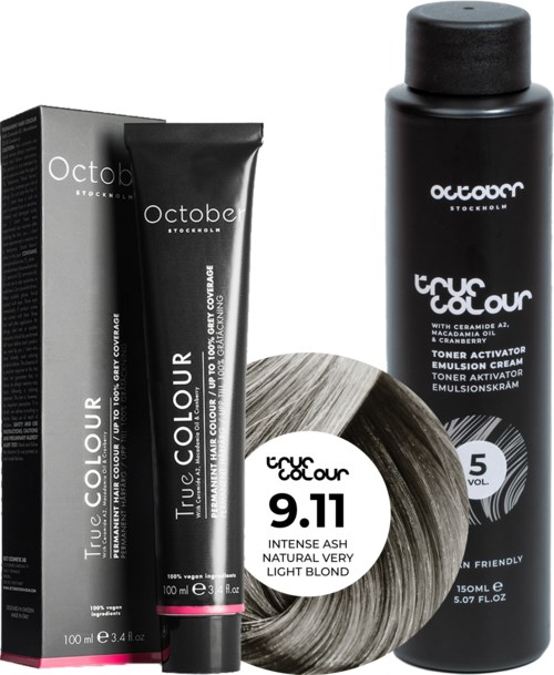 A hair dye kit with a black tube, a box, a bottle labeled 'true colour,' and a hair roll.