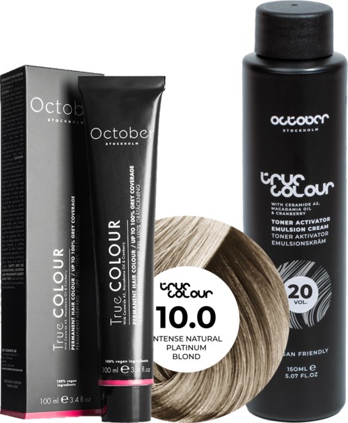 Black hair dye and toner with a package, applicator bottle, and hair color sample. Emphasizes natural blonde shade with volume 20.