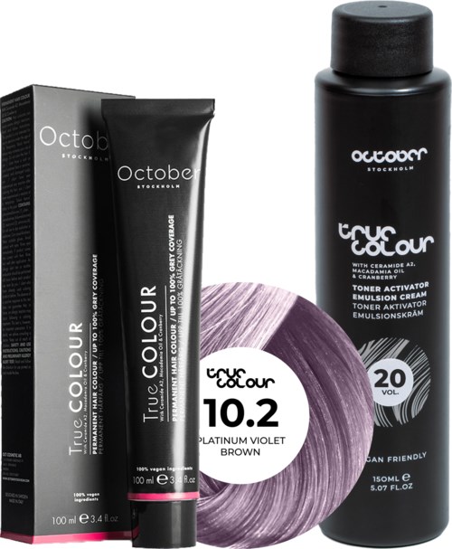 A black bottle and a tube of hair dye, purple hair color block, and a black box with white text.