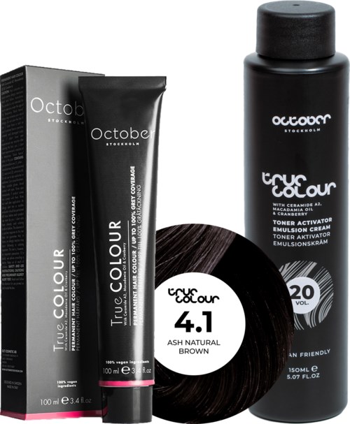 Black hair dye tube and bottle, labeled 'True Colour,' with a hair color chart. Hair extension also shown.