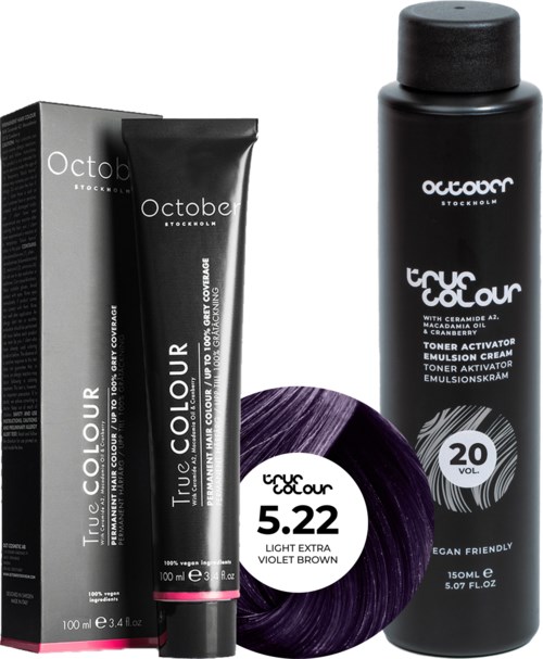A hair color kit with a box, tube, and bottle of dark purple dye for hair coloring.