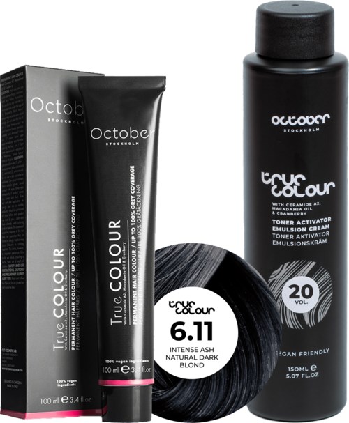 Hair dye kit includes a black bottle, a tube, a box, and a hair swirl, all labeled 'Octa' and 'True Colour.'