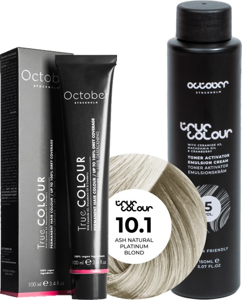 A hair dye kit with a box, a tube, a bottle, and a hair color swatch in blond.