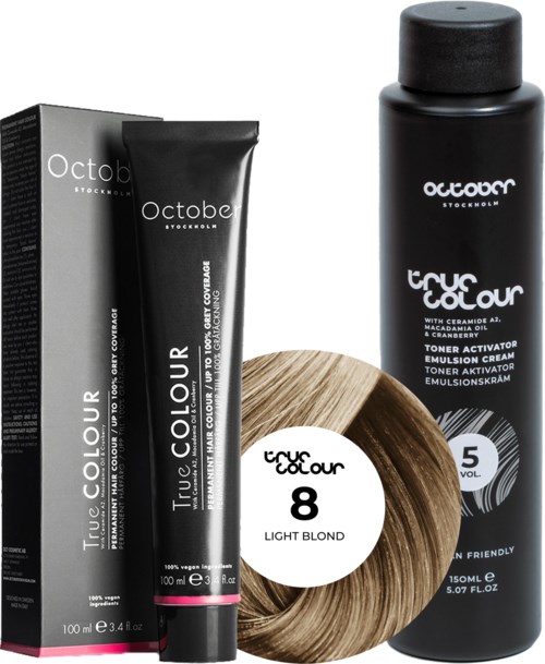 Black and white hair color products, including a tube, a bottle, a box, and a hair color wheel.