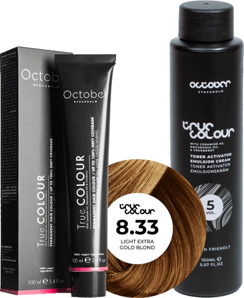 A black bottle, a box, a tube, and a piece of hair in a color label, possibly for hair dye or hair product.