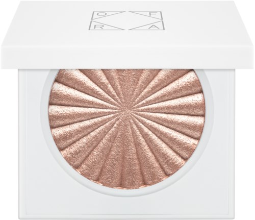 Ein runder Make-up-Produkt mit glänzendem Sonnenstrahlenmuster in einem weißen Gehäuse mit Logo.
