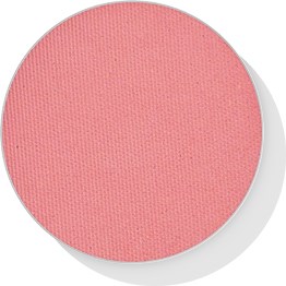 Een ronde, roze getextureerde oppervlakte, waarschijnlijk een makeup blush of schoonheidsproduct.