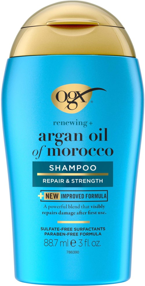 Een blauwe shampoo fles met een gouden deksel, gemarkeerd voor reparatie en kracht, bevat arganolie uit Marokko.