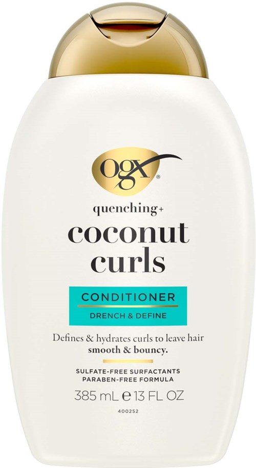 A white bottle with a gold cap, label says coconut curls conditioner, mentions coconut oil, sweet honey, citrus, and sulfate-free.