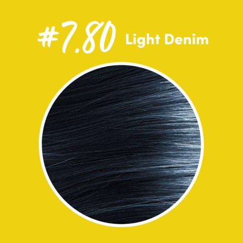 Het is een haarverf cirkel gemarkeerd Light Denim met het nummer 7.80 op een gele achtergrond.