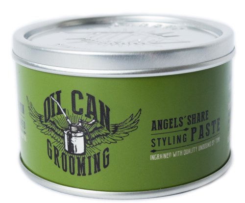 Green container of grooming paste with wings and a bottle logo, labeled 'On Can Grooming' and 'Styling Paste.'