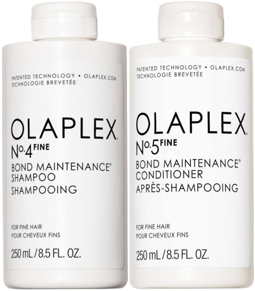 Twee witte flessen met Olaplex nr 4 en nr 5, shampoo en conditioner, elk 250 ml.
