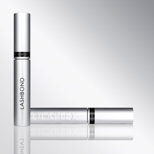 Twee zilveren tubes, één staand en één liggend, gemarkeerd LashBond en OLAPLEX, waarschijnlijk haarverzorgingsproducten.