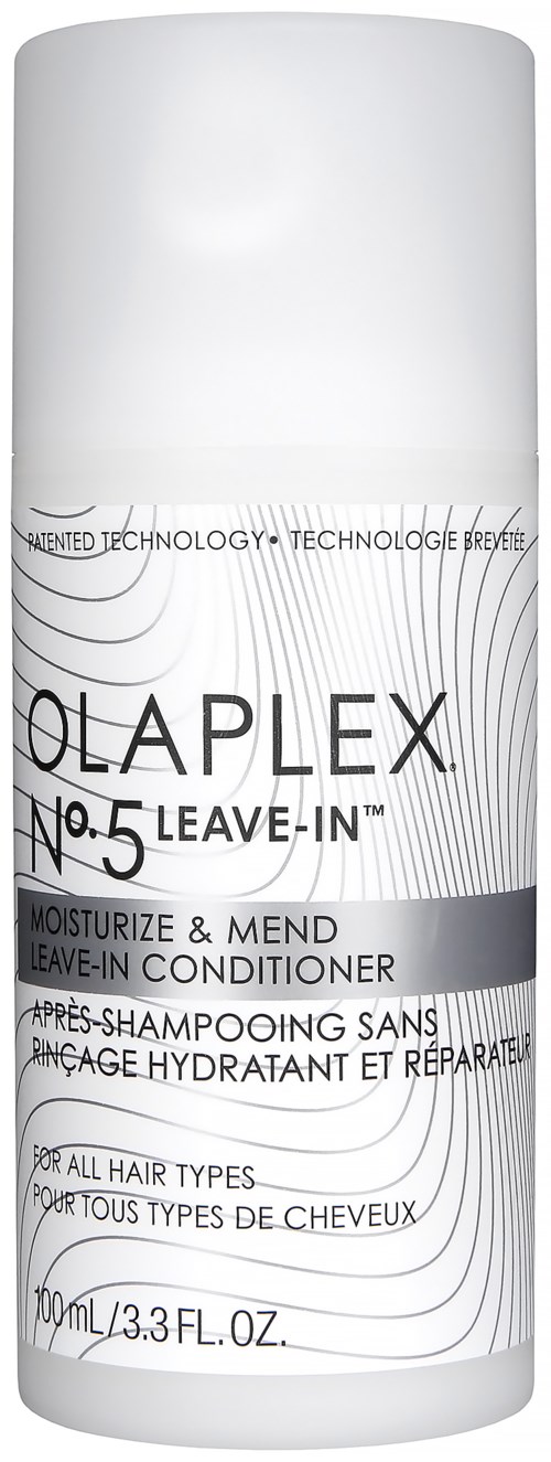 A white bottle of Olaplex No.5 Leave-In conditioner for all hair types, moisturizing and repairing hair.