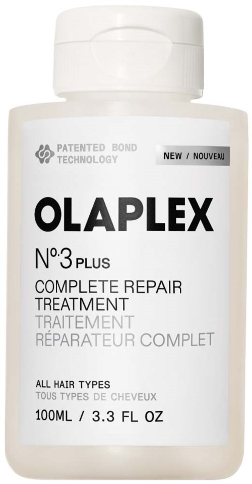 A white bottle of Olaplex No. 3 Plus repair treatment for all hair types with a clean label.