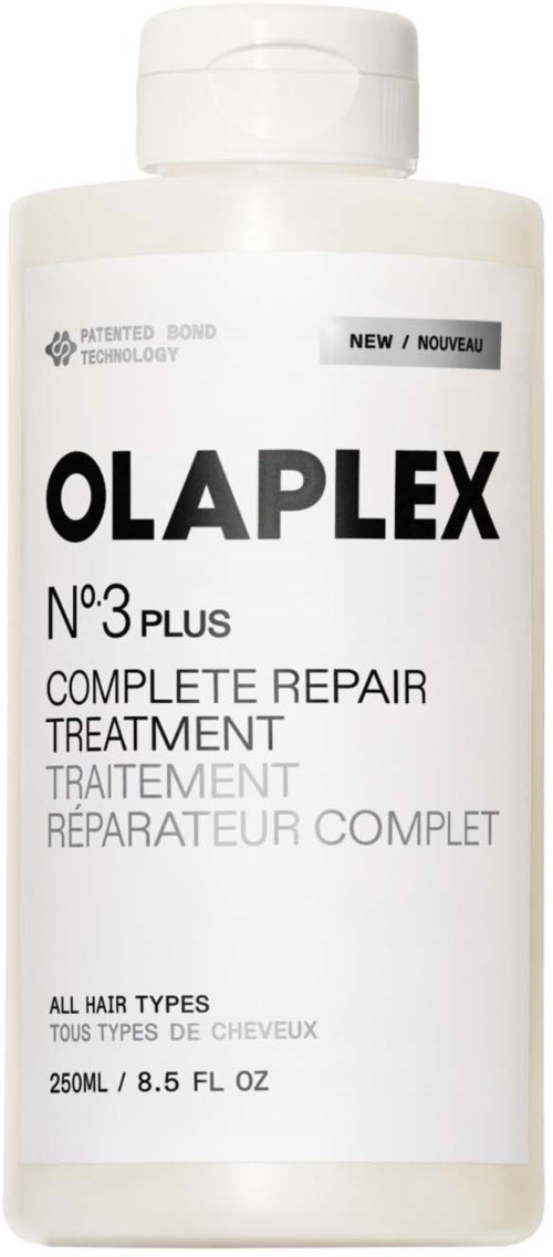 En vit flaska med svart text säger Olaplex No. 3 Plus, för hårreparation, storlek 250 ml.