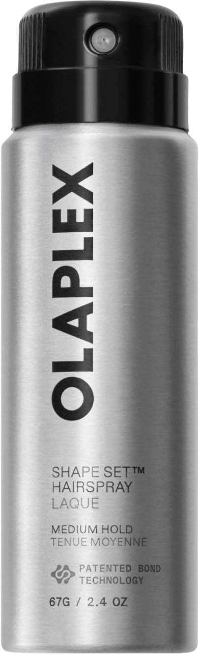En silverfärgad sprayflaska av Olaplex Shape Set hairspray med svart lock, med produktnamn och detaljer i svart text.