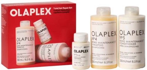 Olaplex hårreparationssats med schampo och balsamflaskor framför en röd förpackningsbox.