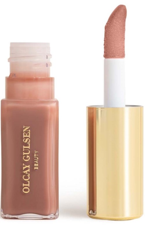 Ein Lipgloss-Flasche in beigem Farbton mit goldener Kappe und passendem Lippenstift.
