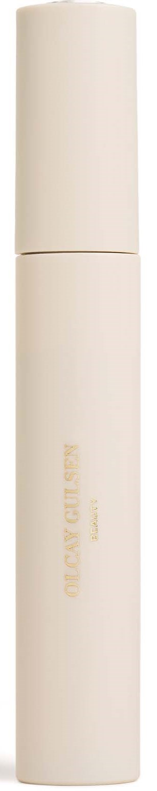 Een witte cilindervormige fles met dop, gemarkeerd als 'Dry Cleaning.'
