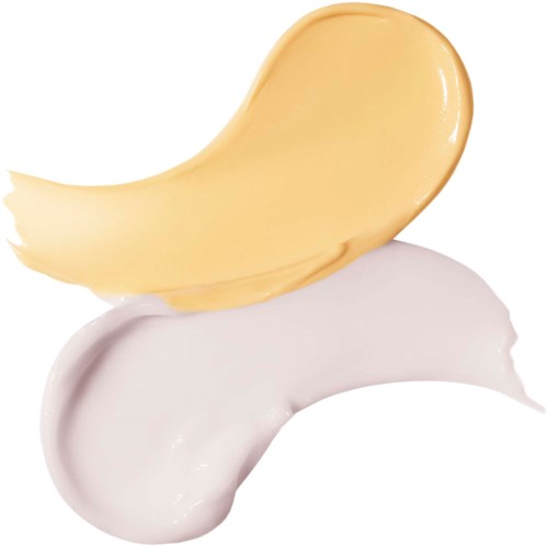 Two dollops of cream, one yellow and one white, on a plain background.