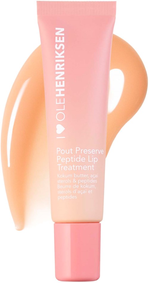 Pink tube with white text, showing Ole Henriksen lip treatment and a smear of peach-colored product.