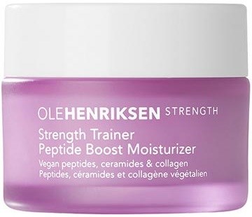 En liten burk med rosa kräm märkt Ole Henriksen Strength, med produktinformation om peptider, ceramider och kollagen.