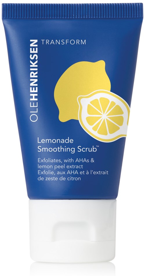 Blå tub märkt 'OLEHENRIKSEN' med citrongrafik, beskriver citrusskrubb för huden.