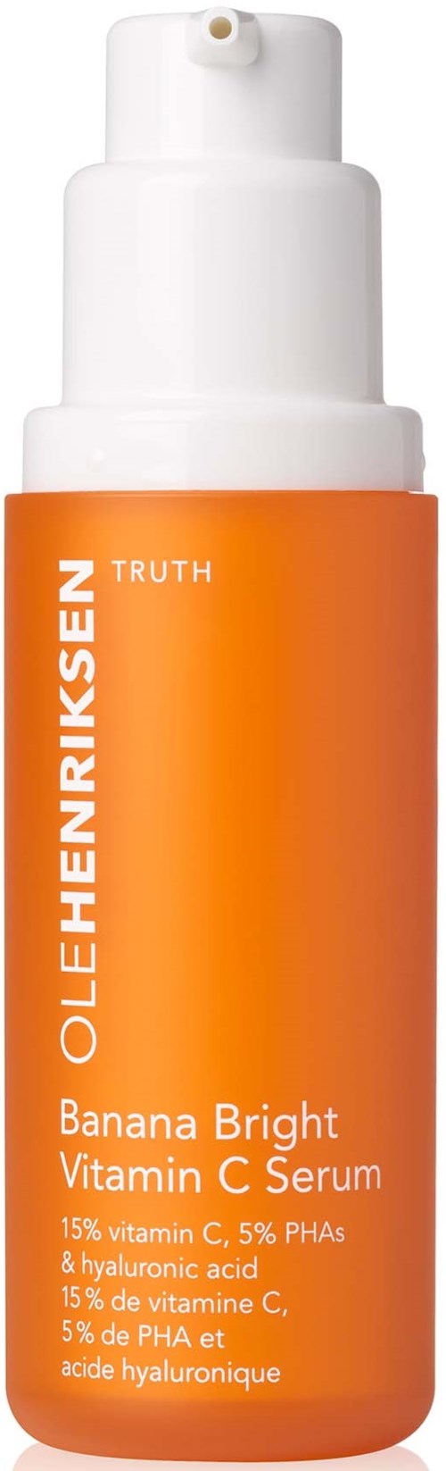 Oranje fles met pomp, gemarkeerd Louis Henriksen Banana Bright Vitamin C Serum.