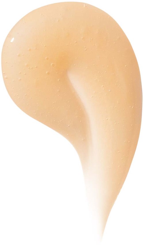 Ein Tropfen beigenfarbiger Flüssigkeit mit weißem Schwanz auf weißem Hintergrund.