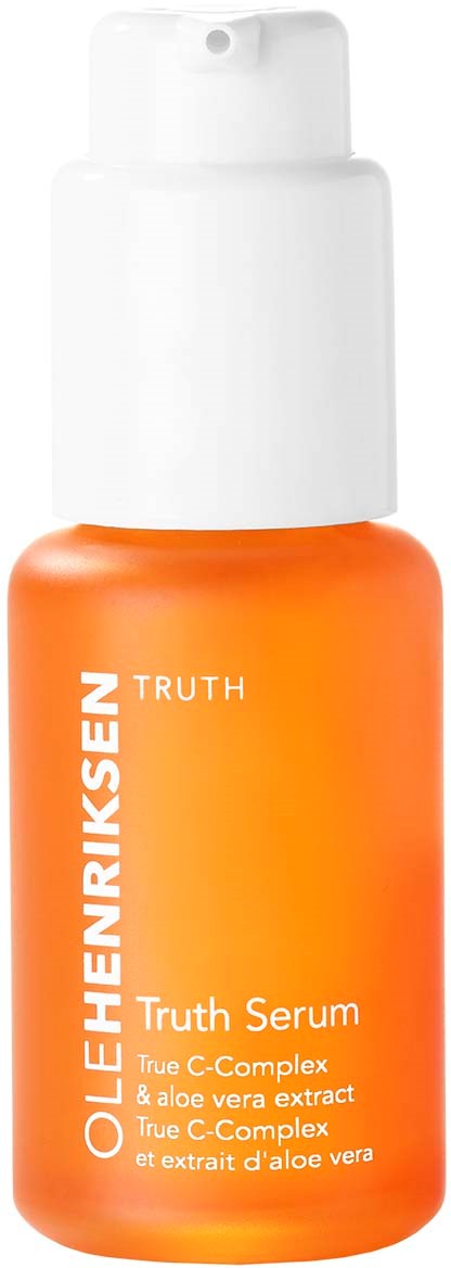 Orangenflasche mit Ole Henriksen Truth Serum, enthält Aloe Vera und Vitamin C für die Haut. Pumpkopf. Text auf Etikett.