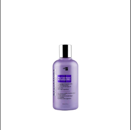 Een paarse fles Blue Conforter Revitalisant Blue haarconditioner met een zilveren deksel.