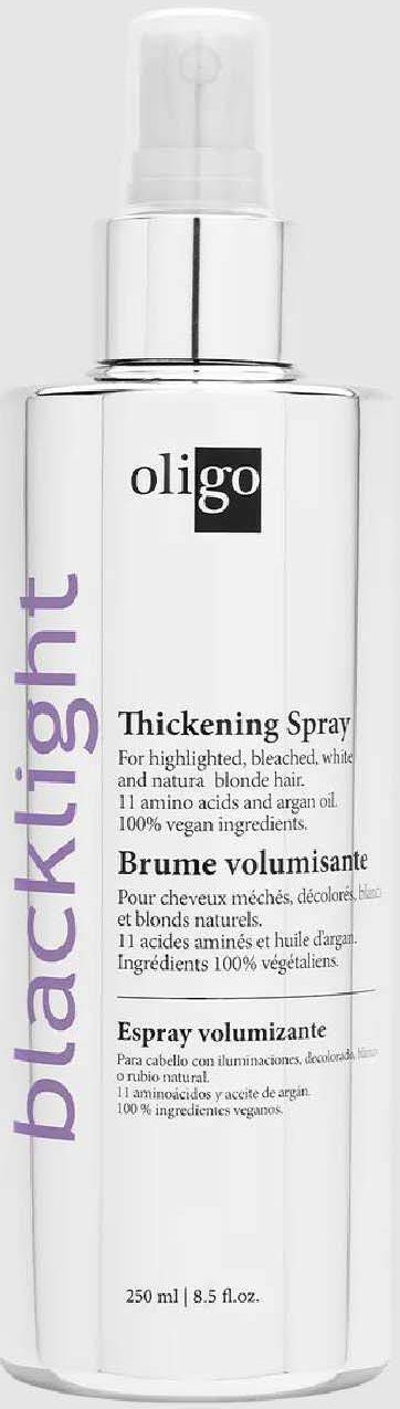 Witte sprayfles met label "Black Light Thickening Spray" van Oligo, voor volume en dikte in haar.