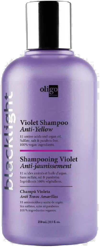 Een paarse fles violette shampoo met zwarte, zilveren en roze tekst, gelabeld als anti-geel shampoo.