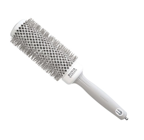 A round hairbrush with a white handle and metal bristles. It has black text that says Olivia Garden.