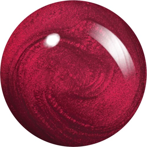 A red, shiny, rounded object with a small white spot and a bright reflective area.