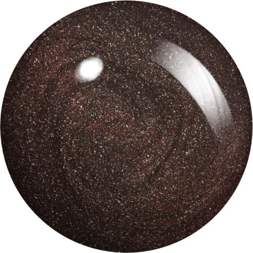 A shiny, round object with many tiny, colorful specks, resembling a planet or a glass of glittery dark liquid.