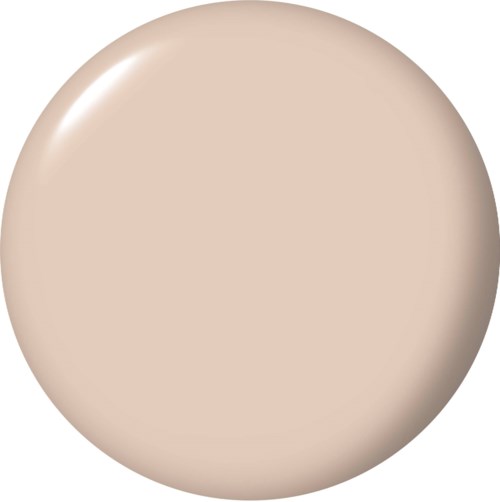En beige, rund sminkkompakt med glatt overflate.