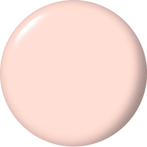 En rund, glatt, pastellrosa sminksvamp med en lätt glänsande yta.