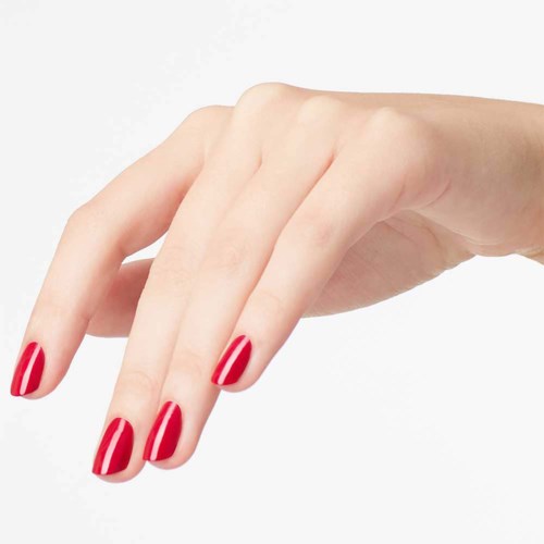 A hand with red-painted nails is shown, fingers slightly bent, against a plain white background.
